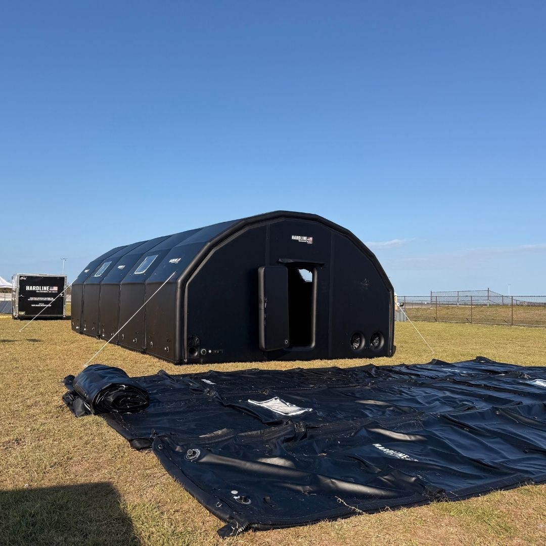 one shelter inflated with second one being set up