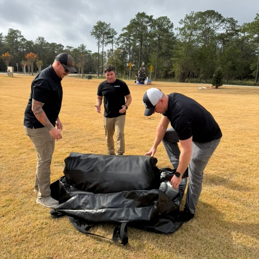 rolling up the inflatable tent